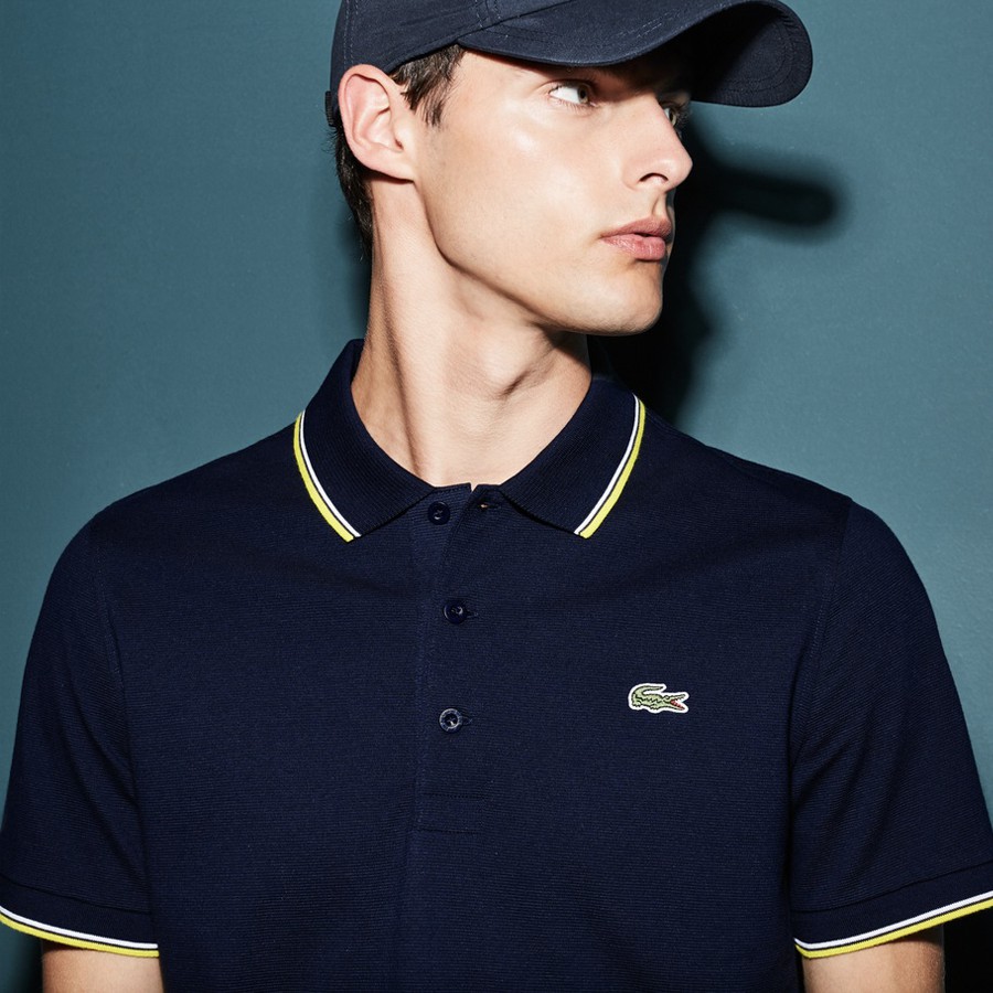 Áo polo Lacoste biểu tượng cá sấu